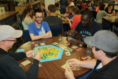 Students playing games during our Board Game Tournament during Orientation 2014